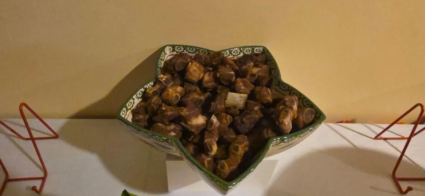 Fried goat meat in a star-shaped bowl